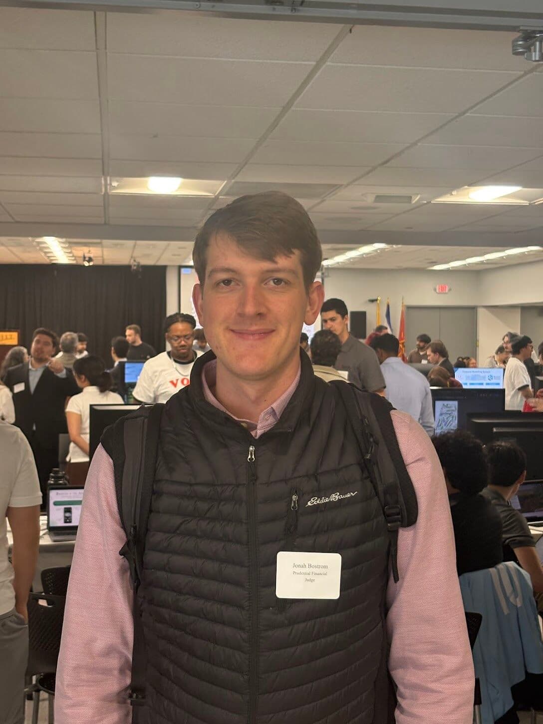 Jonah wearing his judge badge at NJIT’s Capstone Showcase